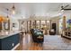 Open-concept living room with spacious seating and natural light at 402 S Lake Victoria Cir, Deland, FL 32724