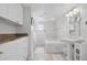 Elegant bathroom showcasing a soaking tub, shower, vanity, and ample cabinet space at 5300 S Atlantic Ave # 6-507, New Smyrna Beach, FL 32169