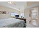 Comfortable bedroom with ocean views features a plush bed, bathroom access, and a calming atmosphere at 5300 S Atlantic Ave # 6-507, New Smyrna Beach, FL 32169