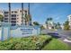 Entrance to Oceanwalk Condominiums complex with lush landscaping and ocean views at 5300 S Atlantic Ave # 6-507, New Smyrna Beach, FL 32169