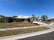 Quaint single Gathering home with well manicured front lawn on a sunny day at 549 Silvergate Loop, Lake Mary, FL 32746