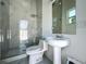 Bathroom with glass shower, a sink, and a toilet at 601 Green Briar Blvd, Altamonte Springs, FL 32714