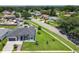 An aerial view showcasing the well-maintained front yard and modern home design at 601 Green Briar Blvd, Altamonte Springs, FL 32714