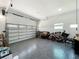 Spacious garage with epoxy flooring, ample storage, and new door at 601 Green Briar Blvd, Altamonte Springs, FL 32714