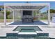A close up shows the hot tub near the entertainment area with a ping pong table and tv at 601 Green Briar Blvd, Altamonte Springs, FL 32714