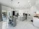 Open-concept layout with a modern kitchen, dining area, and seamless transition to the living space, ideal for entertaining at 601 Green Briar Blvd, Altamonte Springs, FL 32714