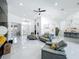 Bright, open living area with modern furnishings and a seamless flow into the kitchen, perfect for entertaining and everyday living at 601 Green Briar Blvd, Altamonte Springs, FL 32714