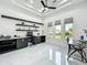 Modern office space with custom shelving, built-in desk, and ample natural light at 601 Green Briar Blvd, Altamonte Springs, FL 32714