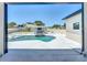 Stunning outdoor pool area with lounging area, manicured landscaping, and an entertainment space at 601 Green Briar Blvd, Altamonte Springs, FL 32714
