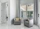 Elegant sitting area featuring comfortable chairs, large windows, and a modern design aesthetic at 601 Green Briar Blvd, Altamonte Springs, FL 32714