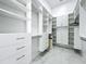 Organized walk-in closet with custom shelves, drawers, and hanging rods for ample storage at 601 Green Briar Blvd, Altamonte Springs, FL 32714