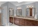 Spacious bathroom with dual sinks, granite countertops, and plenty of storage at 633 N Longview Pl, Longwood, FL 32779