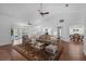 Bright and airy living room featuring a vaulted ceiling, hardwood floors, and stylish decor at 633 N Longview Pl, Longwood, FL 32779