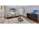 Comfortable main bedroom features hardwood floors and neutral paint at 633 N Longview Pl, Longwood, FL 32779