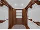 Walk-in closet with built-in shelving and drawers at 633 N Longview Pl, Longwood, FL 32779