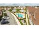 Aerial view of a community pool surrounded by townhouses at 7572 Sunny Dreams Ln, Kissimmee, FL 34747