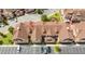 Aerial view of townhomes, landscaped grounds, parking areas, and common spaces at 7572 Sunny Dreams Ln, Kissimmee, FL 34747