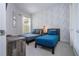 A clean guest bedroom with two twin beds and modern decor at 7572 Sunny Dreams Ln, Kissimmee, FL 34747