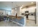 Bright eat-in kitchen with stainless steel appliances, granite countertops and pendant lighting at 7572 Sunny Dreams Ln, Kissimmee, FL 34747