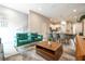 Open-concept living room and dining area featuring modern decor and furnishings at 7572 Sunny Dreams Ln, Kissimmee, FL 34747