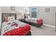 bedroom showcasing two twin beds with themed bedding and coordinated decor at 8215 Roseville Blvd, Davenport, FL 33896