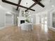 Large lobby with high ceilings, fireplace, chandelier, and tiled floors for a welcoming space at 8215 Roseville Blvd, Davenport, FL 33896