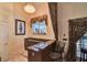 Cozy bar area with marble countertops, a sink, and a window overlooking the outdoor area at 8713 S Bay Dr, Orlando, FL 32819