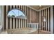 Bright bathroom displaying a luxurious soaking tub with a half-moon window, plus a separate toilet for convenience at 8713 S Bay Dr, Orlando, FL 32819