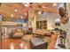 Spacious living room featuring a vaulted wood ceiling and a brick fireplace at 8713 S Bay Dr, Orlando, FL 32819