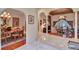 Open floor plan featuring elegant archways connecting the dining and living areas with tile floors at 8713 S Bay Dr, Orlando, FL 32819