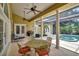 Charming outdoor patio with a pool view, perfect for enjoying warm weather and scenic surroundings at 8713 S Bay Dr, Orlando, FL 32819