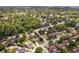 Peaceful residential area surrounded by mature trees, providing a serene and inviting neighborhood ambiance at 896 Satin Leaf Cir, Ocoee, FL 34761