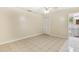 Bedroom featuring tiled floor, closet, and access to private bathroom at 896 Satin Leaf Cir, Ocoee, FL 34761