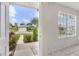 From the front door, you can see the front of the house with the front yard and driveway at 896 Satin Leaf Cir, Ocoee, FL 34761