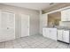 Kitchen area featuring white cabinets, granite countertops, and stainless steel dishwasher at 896 Satin Leaf Cir, Ocoee, FL 34761