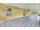 Large screened patio with decorative tile, offering an indoor-outdoor living space at 896 Satin Leaf Cir, Ocoee, FL 34761