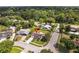 Street view of a neat home, enhanced by mature landscaping, complemented by a peaceful, verdant setting at 896 Satin Leaf Cir, Ocoee, FL 34761