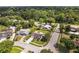 Inviting street view showcases a charming residence amidst lush greenery, highlighting the home's curb appeal at 896 Satin Leaf Cir, Ocoee, FL 34761