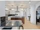 Spacious kitchen with a large center island, stainless steel appliances, and open layout, perfect for entertaining at 9724 Chestnut Ridge Dr, Windermere, FL 34786
