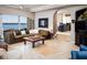 Cozy living room with a view of the lake at 9724 Chestnut Ridge Dr, Windermere, FL 34786