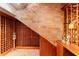 Wine cellar featuring brick walls, and wooden wine racks at 9724 Chestnut Ridge Dr, Windermere, FL 34786