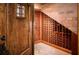 Charming wine cellar with brick accents and wooden storage racks at 9724 Chestnut Ridge Dr, Windermere, FL 34786