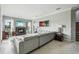 Bright living room features a fireplace, modern gray sofa, and tile floors at 9736 Hatton Cir, Orlando, FL 32832