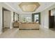 Well-lit living room with comfortable couches, leading into other areas of the house at 9736 Hatton Cir, Orlando, FL 32832