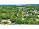 Aerial view of neighborhood with mature trees at 1608 Victoria Way, Winter Garden, FL 34787