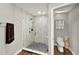 Sleek bathroom featuring a modern glass shower and a nearby toilet, designed for convenience and comfort at 1608 Victoria Way, Winter Garden, FL 34787