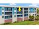The screened in balcony offers an outdoor extension of the living space at 1 Riverwalk Dr # 303, New Smyrna Beach, FL 32169