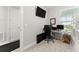 Functional bedroom with desk, chair, and bunk beds, perfect for a home office or study area at 1 Riverwalk Dr # 303, New Smyrna Beach, FL 32169
