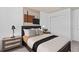 Bedroom with comfortable bed, side tables, and a closet at 10154 Hadley St, Orlando, FL 32829