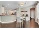 Eat-in dining space showcasing a marble top table and gray chairs situated next to the kitchen and stainless appliances at 10252 Kristen Park Dr, Orlando, FL 32832